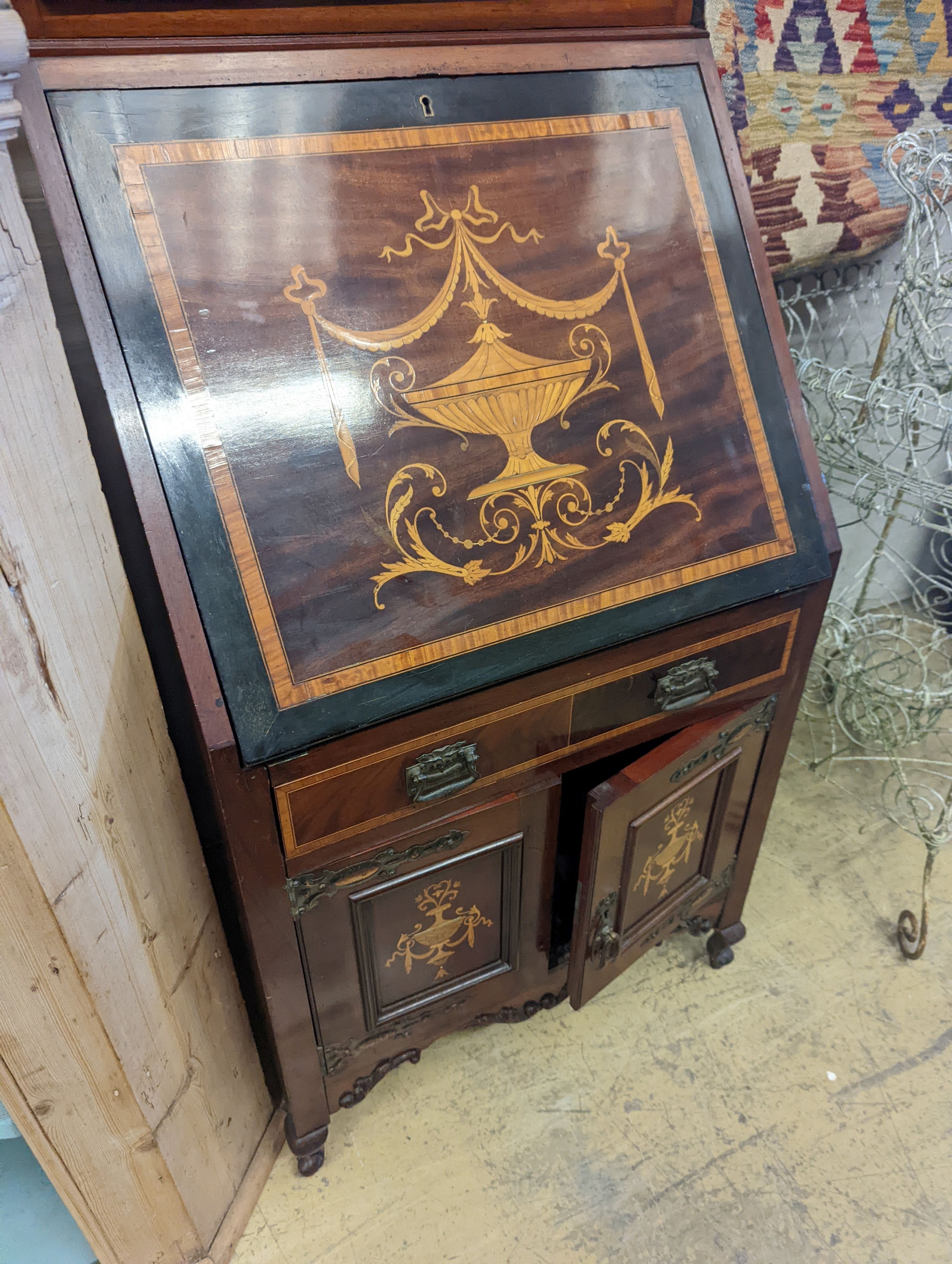 An Edwardian marquetry inlaid satinwood banded mahogany bureau bookcase of narrow proportions, width 58cm, depth 46cm, height 194cm